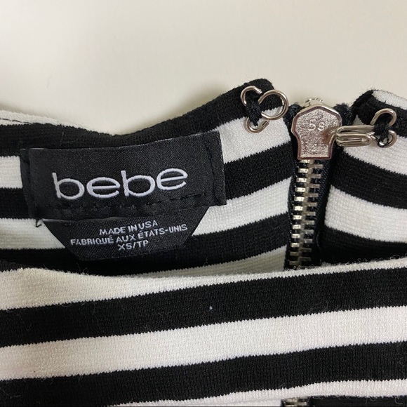 Bebe peplum cutout black & white stripes zipper xs - Picture 2 of 5